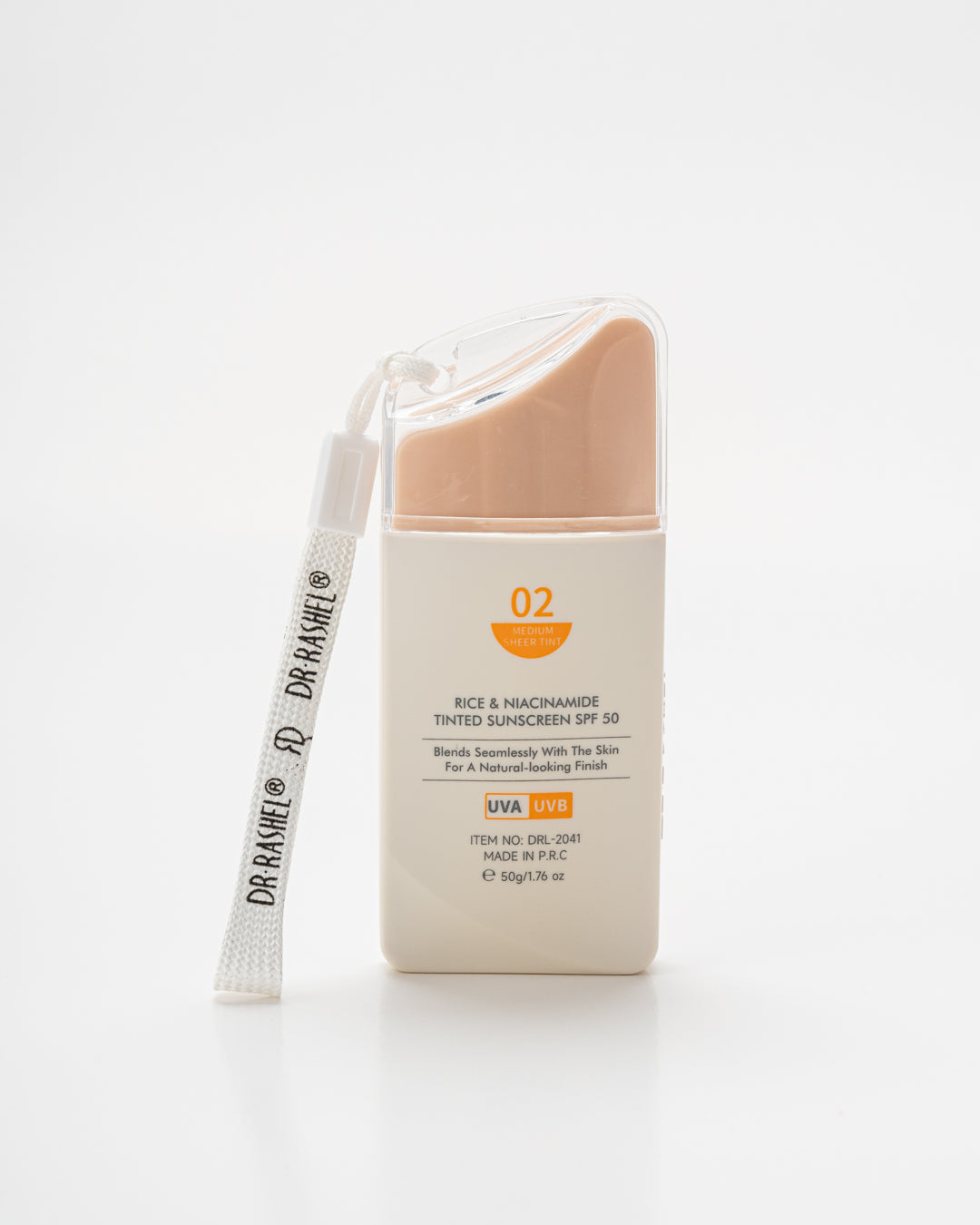 Close-up swatch of Dr Rashel tinted sunscreen in a warm beige tone